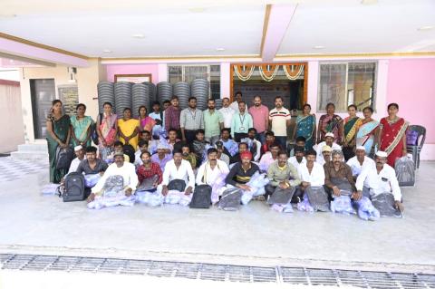 Training team with beneficiaries who received fishing net